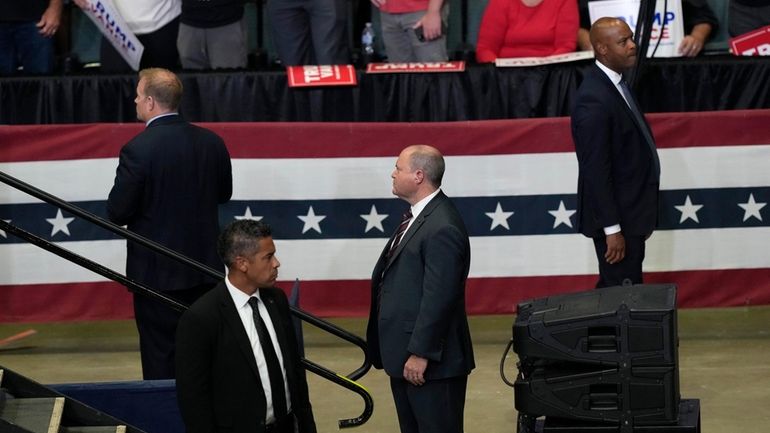 Members of the U.S. Secret Service look on as Republican...