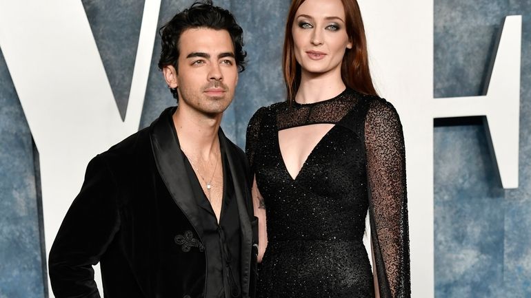 Joe Jonas, left, and Sophie Turner appear at the Vanity...