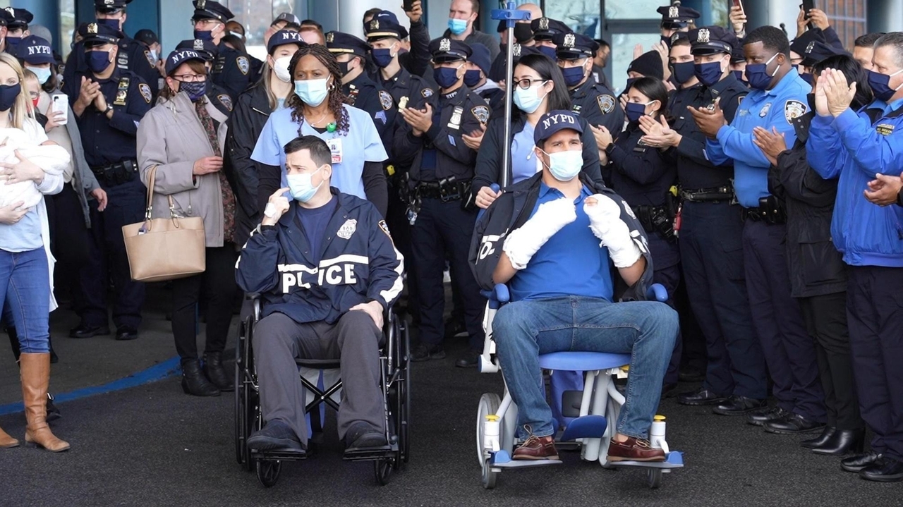 Two NYPD cops from Long Island released from hospital after Queens ...
