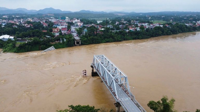 A bridge collapse due to floods triggered by typhoon Yagi...