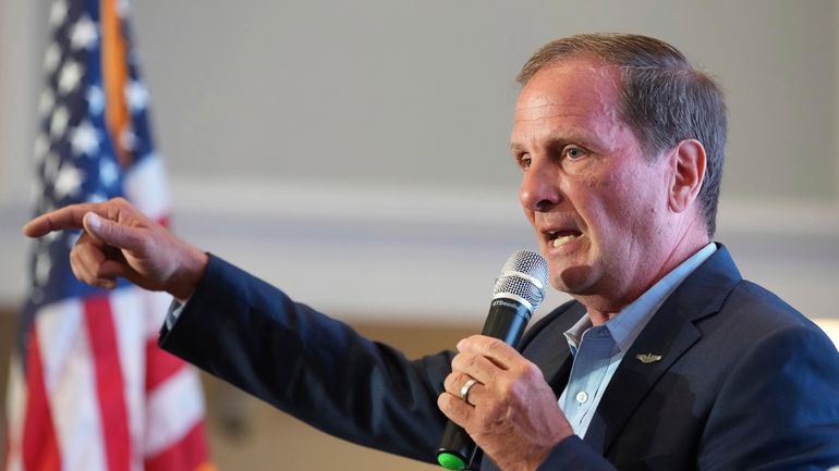 File - Utah Rep. Chris Stewart talks to supporters during...