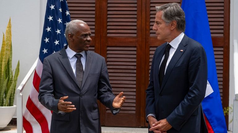 U.S. Secretary of State Antony Blinken, right, and Haitian Prime...