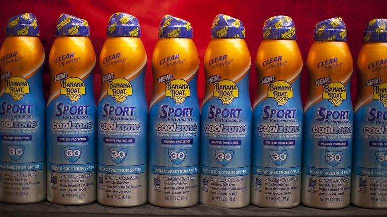 Bottles of Banana Boat Sport Performance Cool Zone sunscreen are...