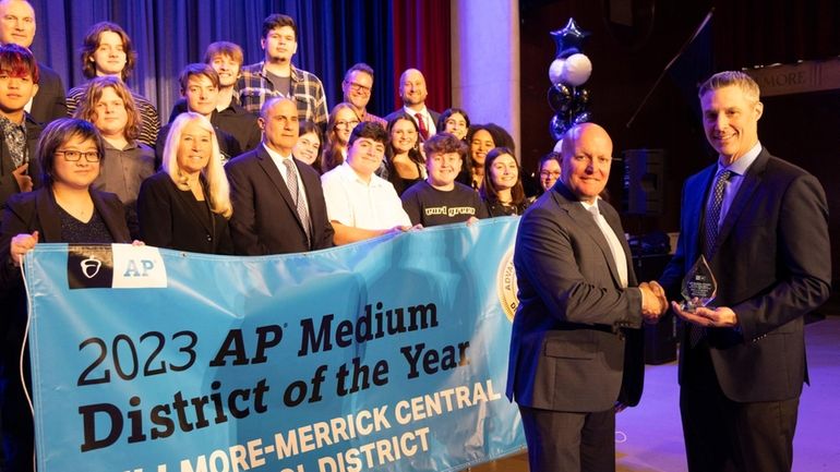 Terry Redican, right, vice president of the College Board's Advanced...