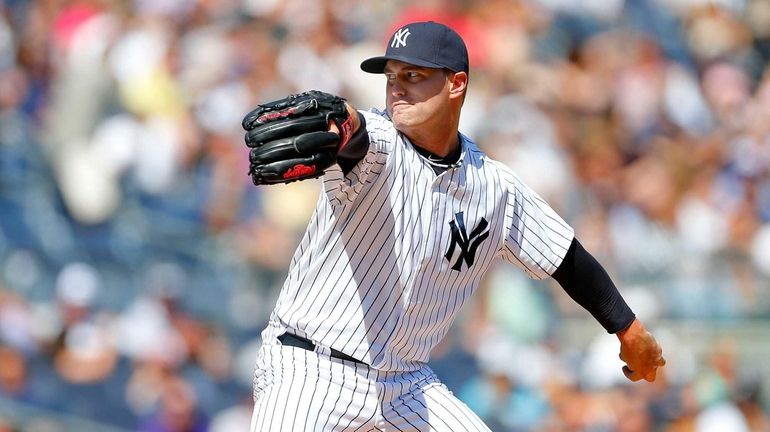 David Huff #60 of the Yankees pitches against the Boston...