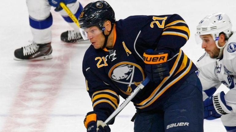 Buffalo Sabres forward Kyle Okposo skates past Tampa Bay Lightning...