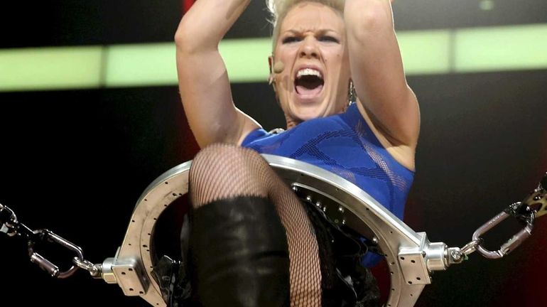 Pink performs during the 2012 iHeartRadio Music Festival at the...