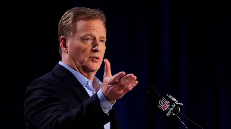 NFL commissioner Roger Goodell speaks to the media during a...