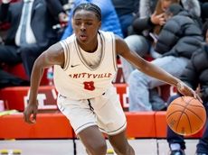 Amityville boys basketball holds off Sayville in overtime