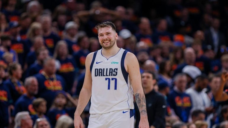 Dallas Mavericks guard Luka Doncic reacts during the second half...