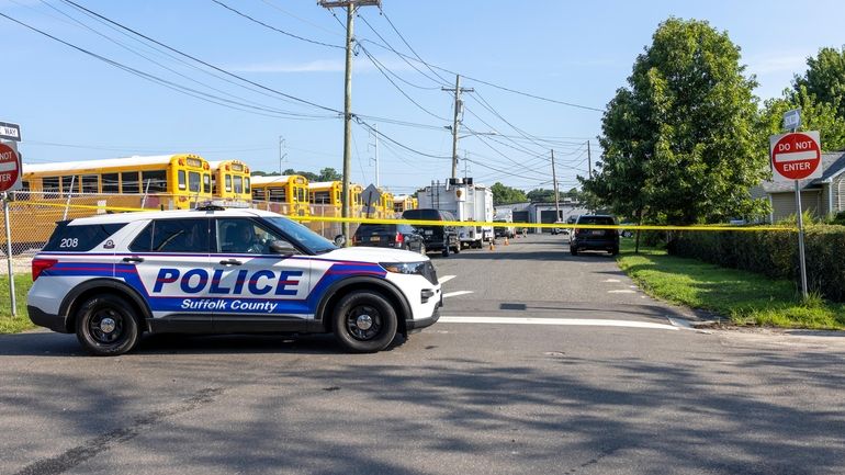 Suffolk County police investigate a fatal shooting on 5th Avenue in...