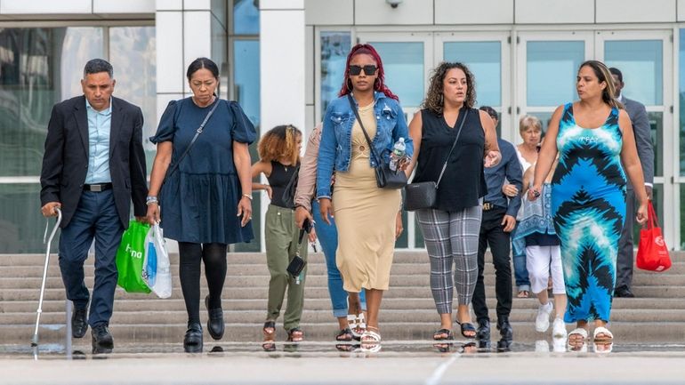 Family and friends of Kenny Lazo leaves federal court in...