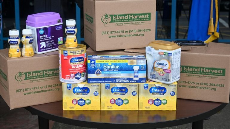 Baby formula on display at a news conference Monday.