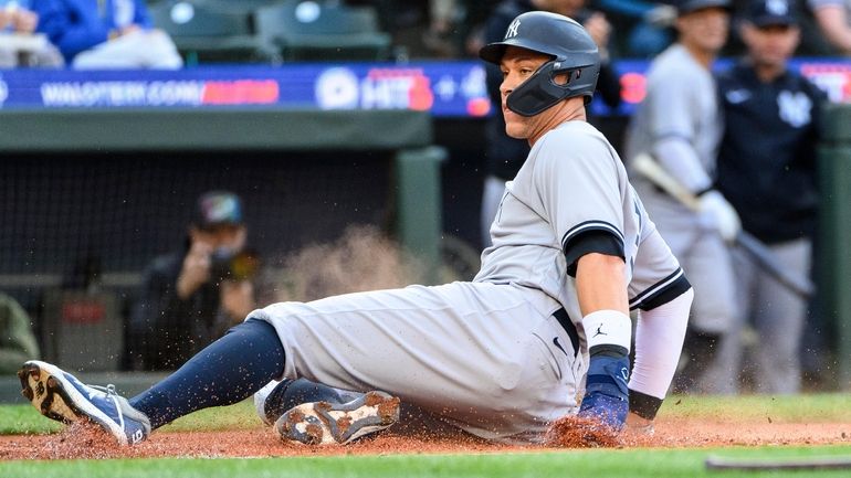 Yankees' Aaron Judge scores on a single by Isiah Kiner-Falefa...