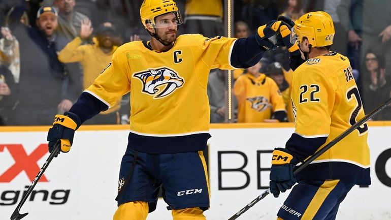 Nashville Predators defenseman Roman Josi (59) celebrates after his goal...