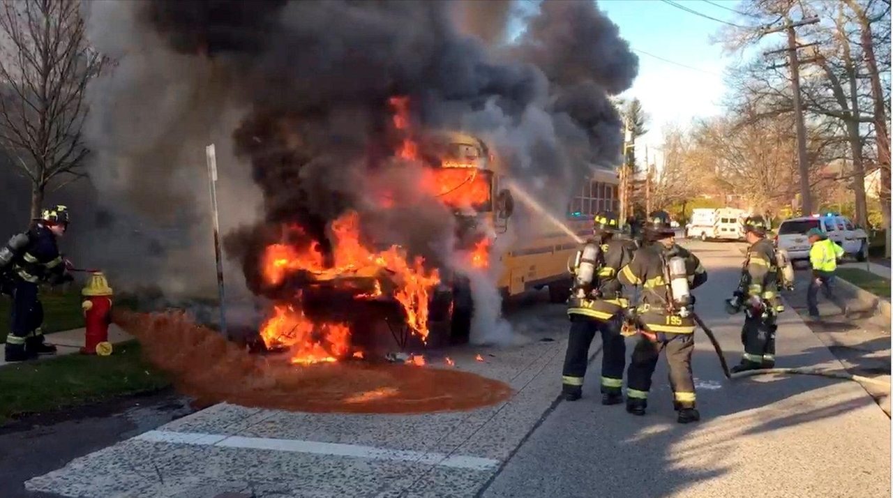 School bus with students on board catches fire - Newsday