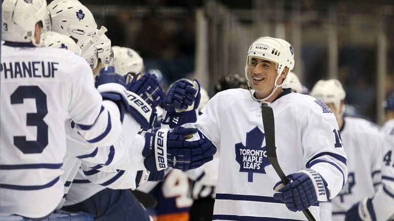 Tomas Kaberle of the Toronto Maple Leafs celebrates a goal...