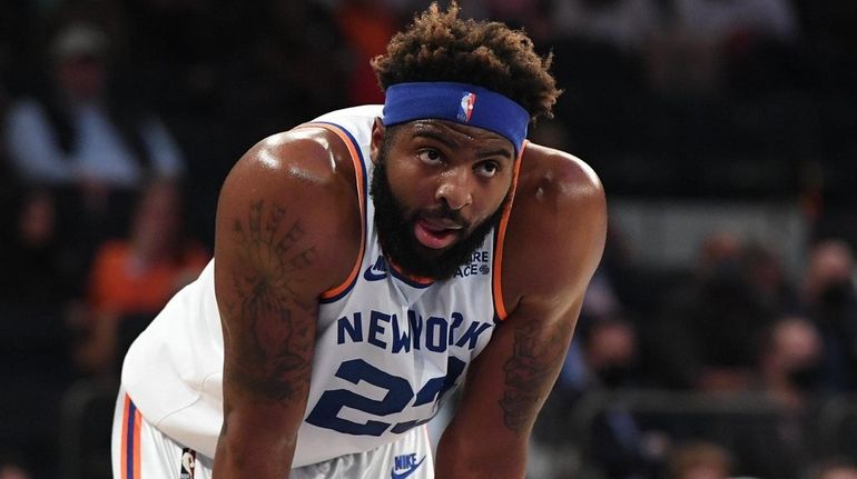 New York Knicks guard RJ Barrett controls the ball against...