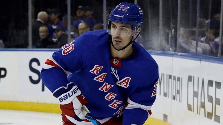 Chris Kreider of the Rangers skates against the Coyotes at...