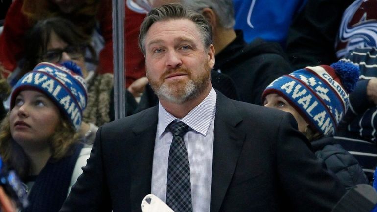 Avalanche head coach Patrick Roy watches during a hockey game...