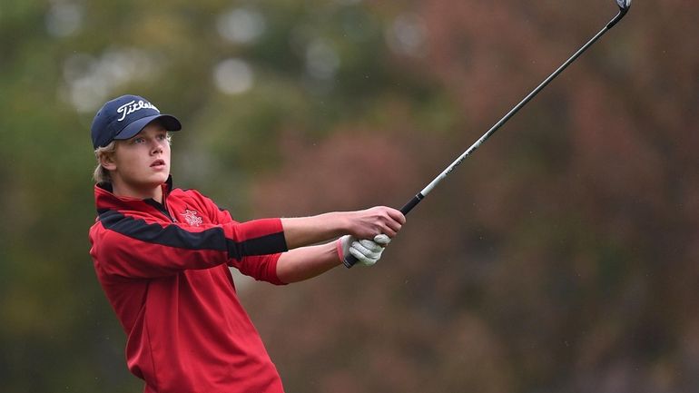 Jack Breutsch of Center Moriches tees off on Hole 16...