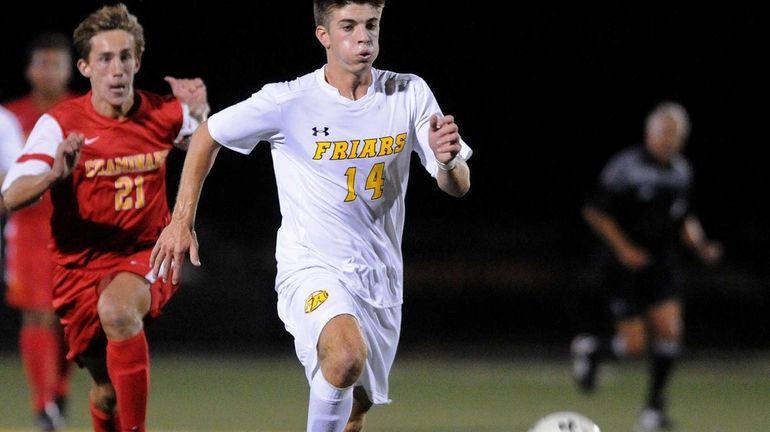 St. Anthony's Jake Giuffrida, right, chases after a loose ball...