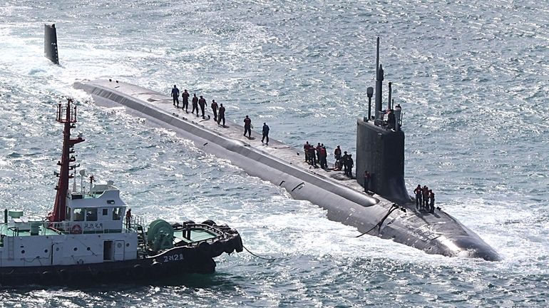 The USS Vermont, a nuclear-powered and fast-attack submarine, enters a...