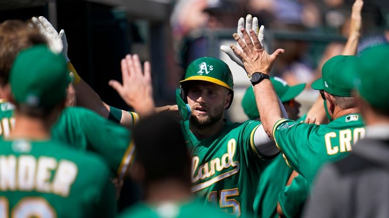 Oakland Athletics' Seth Brown celebrates his two-run home run against...