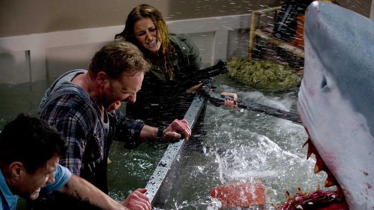 Ian Ziering, center, stars in the original "Sharknado."