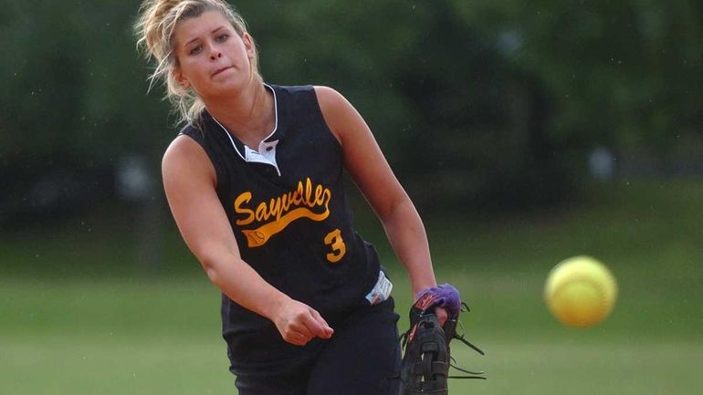 Sayville's Merissa Selts delivers to the plate in the Class...