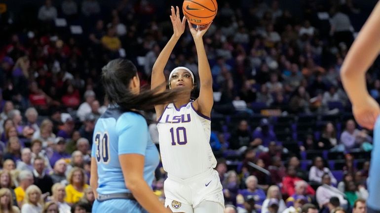 LSU forward Angel Reese (10) shoots in the first half...