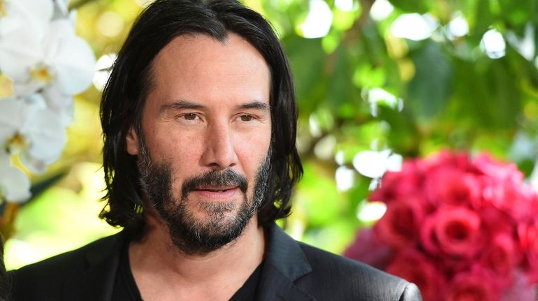 Keanu Reeves attends the "Destination Wedding" photo call on Aug....