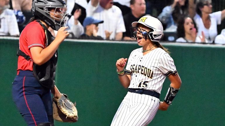 Emily Balducci #15 Massapequa celebrates as she scores during the...