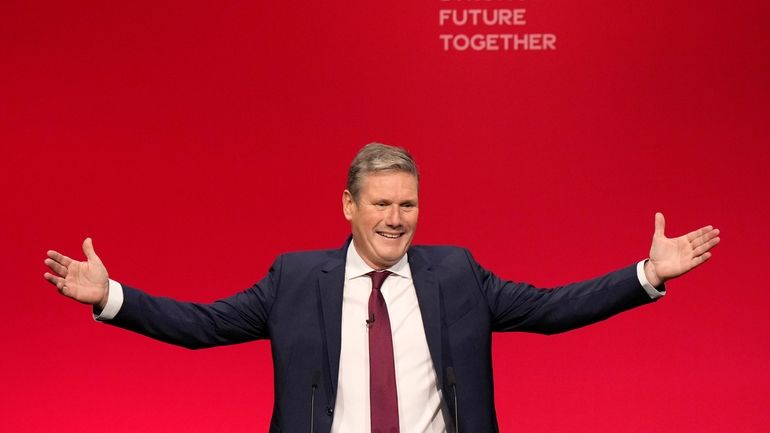 Leader of the British Labour Party Keir Starmer gestures as...
