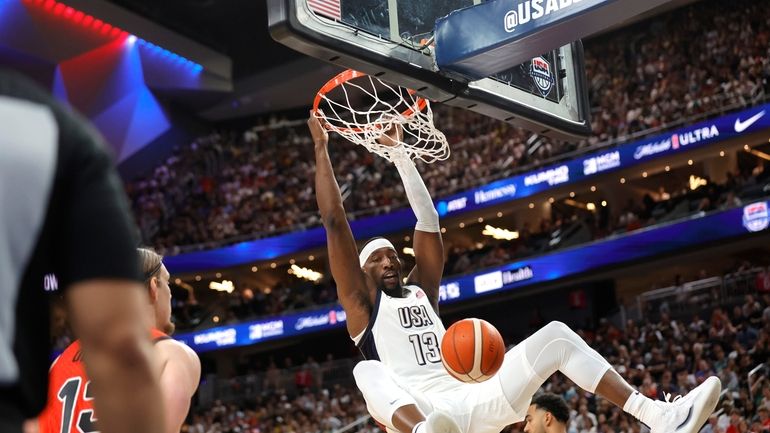 United States center Bam Adebayo (13) dunks during the first...