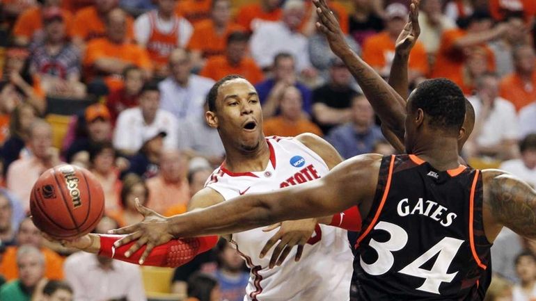 Ohio State forward Jared Sullinger (0) looks to pass around...