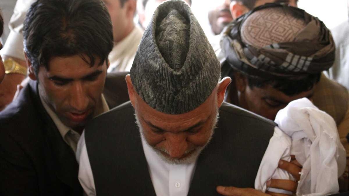 Karzai sobs alongside slain brother's body - Newsday