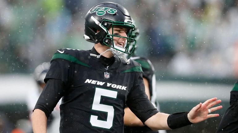 Mike White of the Jets reacts after a touchdown in the second...