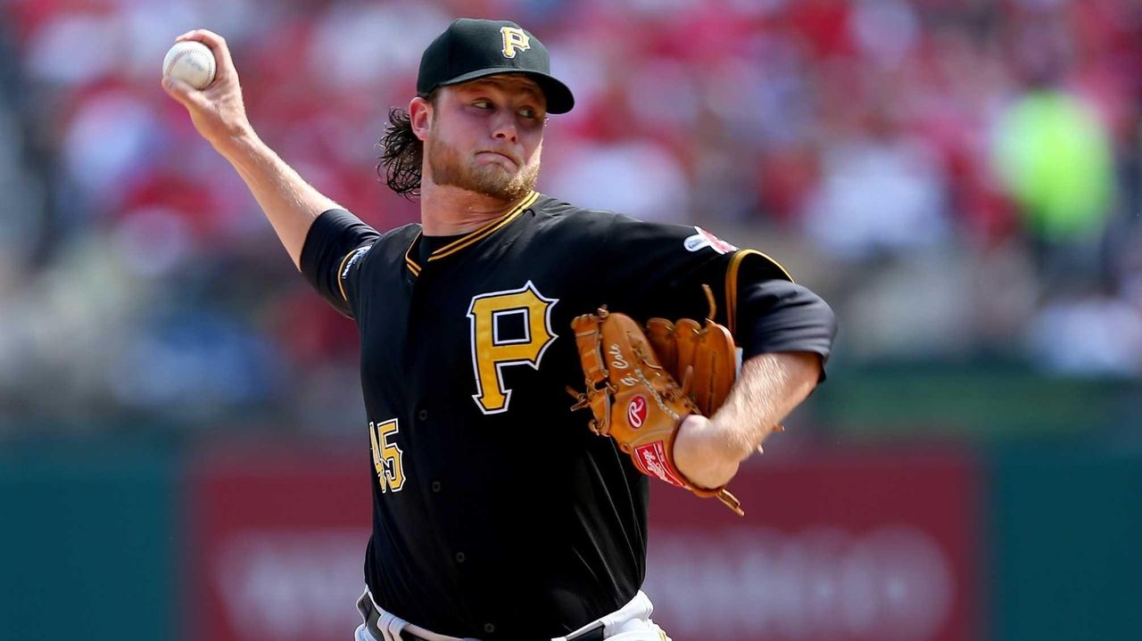 Pittsburgh Pirates manager Clint Hurdle shows the All-Star jersey for  starting pitcher Gerrit Cole after he accepted it for Col before a baseball  game against the St. Louis Cardinals, Sunday, July 12