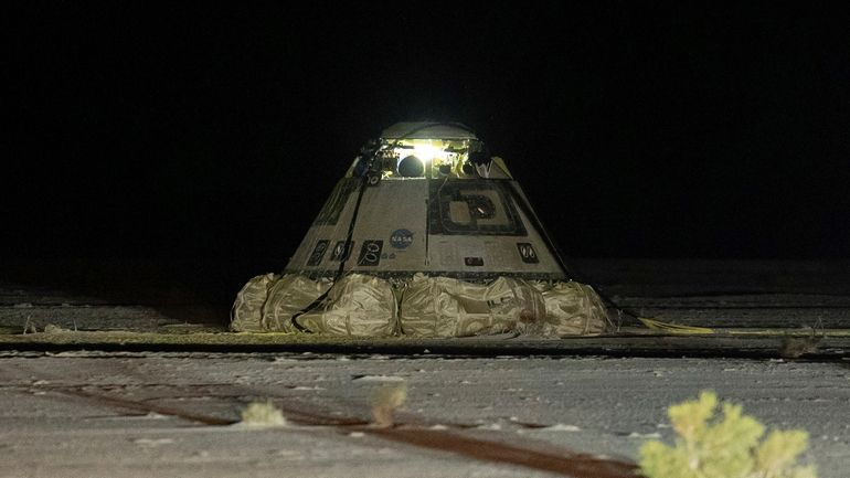 The empty Boeing Starliner capsule sits at White Sands Missile...