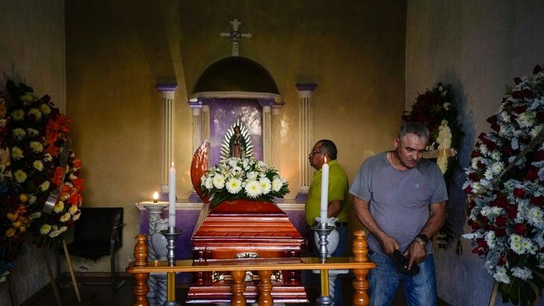 Mourners attended the wake of mayoral candidate Armando Perez in...