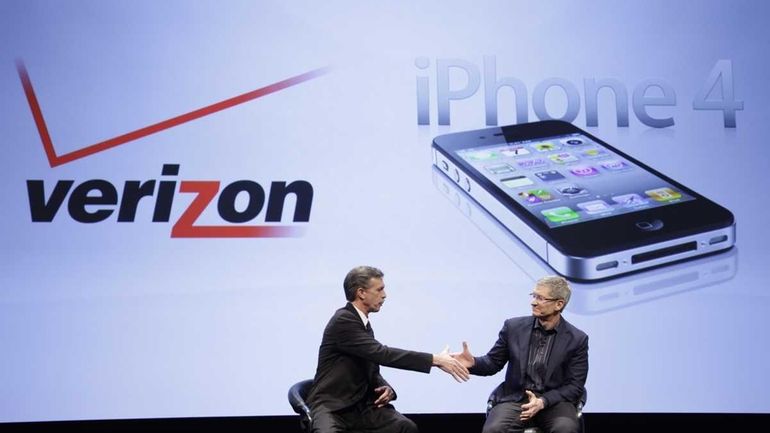 Dan Mead, left, chief executive of Verizon Wireless, and Tim...