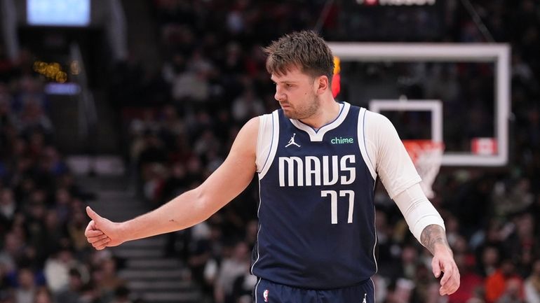 Dallas Mavericks' Luka Doncic reacts during his team's win over...