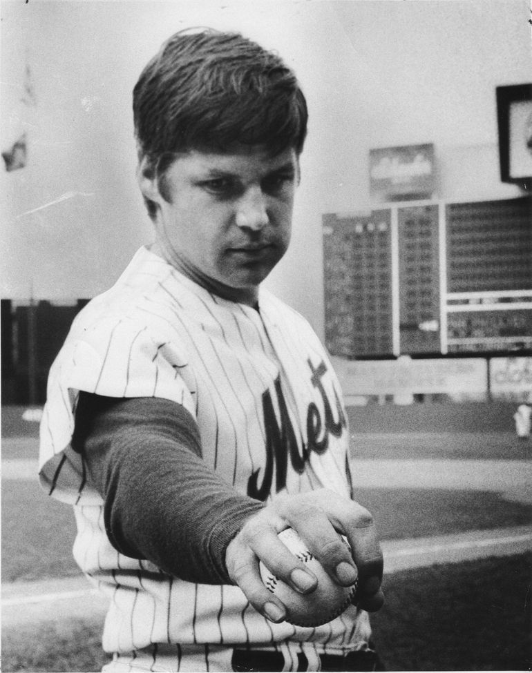 Former New York Met Tom Seaver throws the final pitch during the closing  ceremony of Shea Stadium following the Mets final regular season game  against the Florida Marlins on September 28, 2008