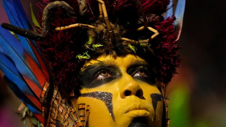 A performer from the Salgueiro samba school parades during Carnival...