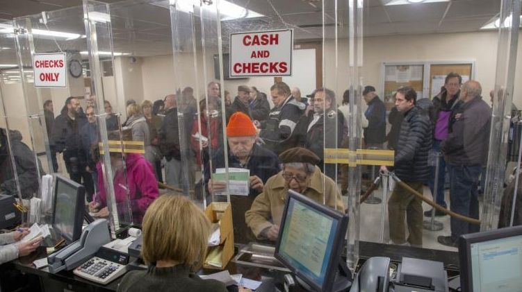 People line-up at the Town of Hempstead tax receiver's office...