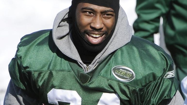New York Jets cornerback Darrelle Revis stretches during football practice....