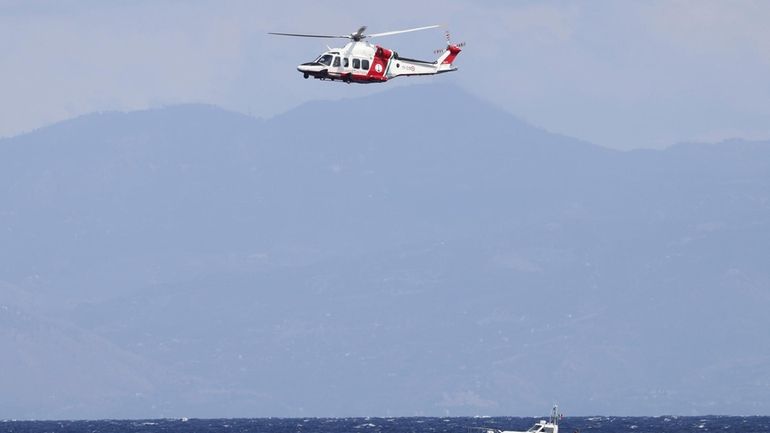 Emergency services at the scene of the search for a...