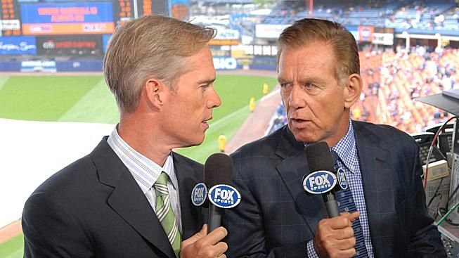 Joe Buck, left, and Tim McCarver in the booth during...