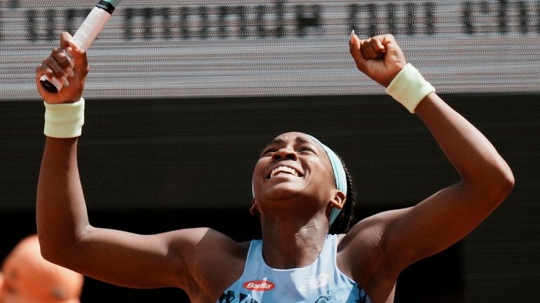 Coco Gauff of the U.S. celebrates as she defeats Sloane...